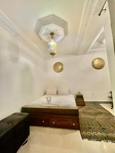 Postel nebo postele na pokoji v ubytování Riad La Vie