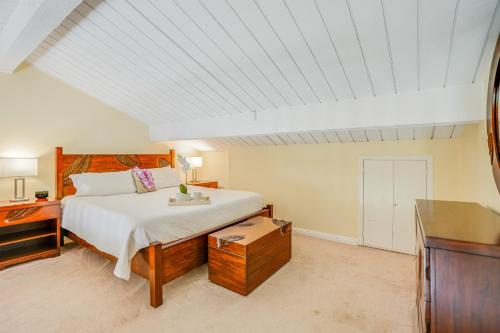 a bedroom with a large bed and a dresser at Hanalei Bay Resort 2301 in Princeville