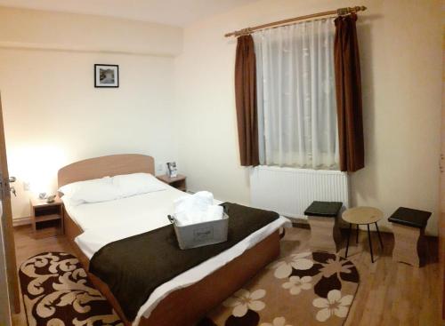 Postel nebo postele na pokoji v ubytování Casa Raisa & Maria