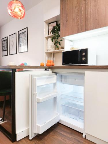 Η κουζίνα ή μικρή κουζίνα στο VIP GREENVILLE Apartment
