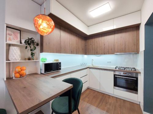 Η κουζίνα ή μικρή κουζίνα στο VIP GREENVILLE Apartment