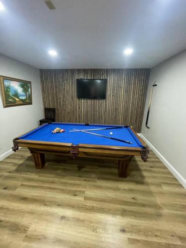 a room with a pool table in a room at Quiet Private House w Hot Tub/Fire pit/Games in Blakeslee