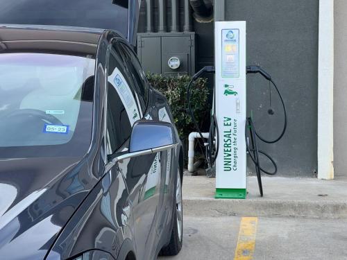 a car is hooked up to a hydrogen fueling station at La Quinta by Wyndham Alvarado in Alvarado