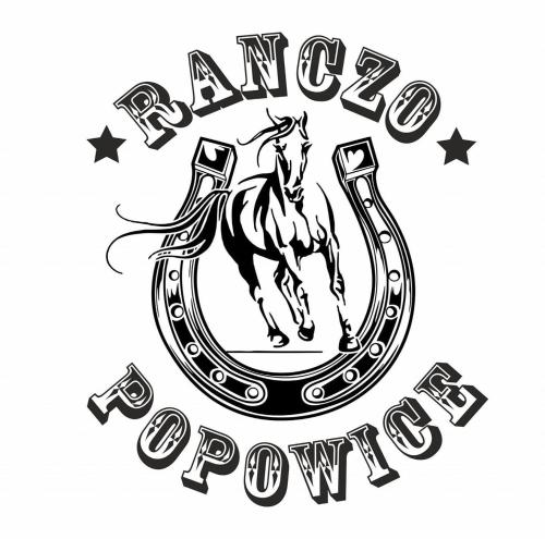 a black and white image of a horse galloping in a circle at Ranczo Popowice in Pątnów