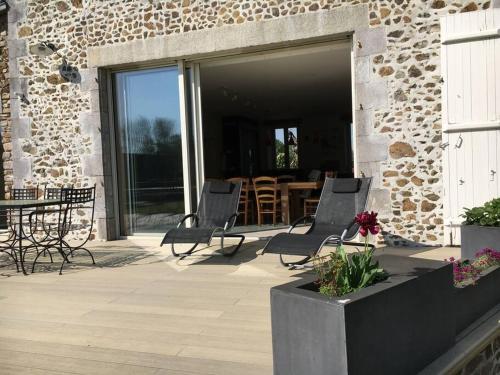 Μπαλκόνι ή βεράντα στο Maison de Caractère à 1 Km de la Mer