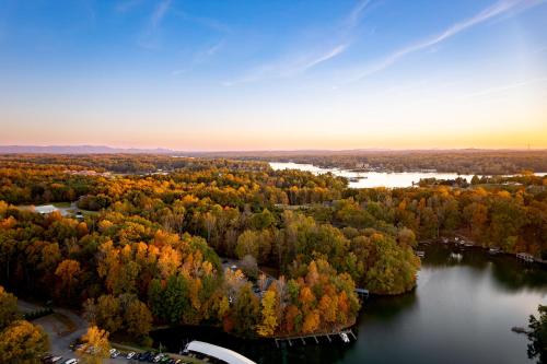 an aerial view of a river and a forest at Halesford Harbour Resort - Smith Mountain Lake in Moneta