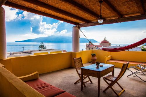 a view from a balcony overlooking the ocean at Hotel Arcangelo - Salina in Santa Marina Salina