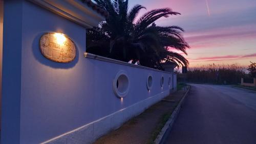 a building with a window on the side of a road at B&B Domus Aurea 20 in San Giovanni Teatino