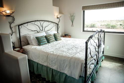 Ένα ή περισσότερα κρεβάτια σε δωμάτιο στο Origins Bed and Breakfast
