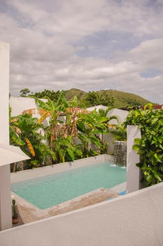 a view of a swimming pool from a house at Casa Celeste Honda in Honda