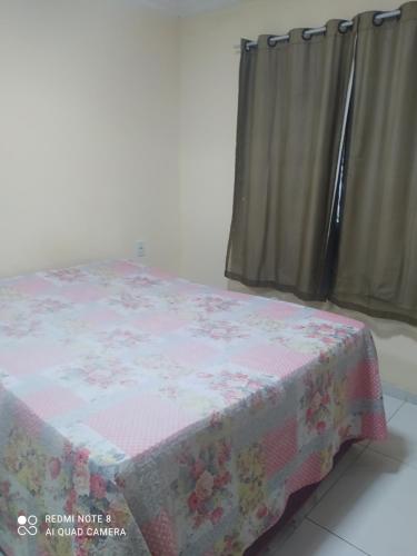 Posteľ alebo postele v izbe v ubytovaní Casa de temporada em Jacaraípe