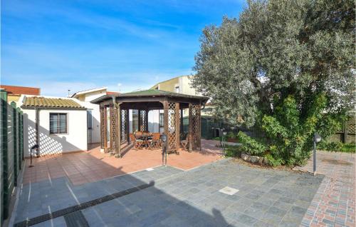 Amazing home in Punta Braccetto with 4 Bedrooms and WiFi