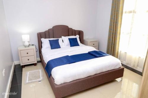 Postel nebo postele na pokoji v ubytování Luxe Furnished Premium Unit