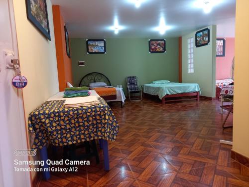 Кровать или кровати в номере Casa Hospedaje San Miguel
