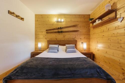 Ένα ή περισσότερα κρεβάτια σε δωμάτιο στο Residence Bec - Happy Rentals