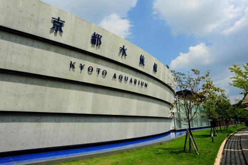 a building with writing on the side of it at Umekoji Potel KYOTO in Kyoto