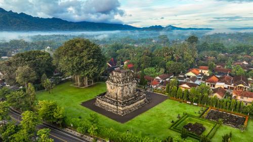 an aerial view of a small town with a park at Villa Borobudur Resort in Borobudur