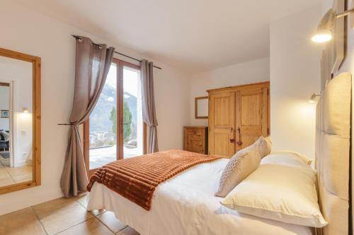 Posteľ alebo postele v izbe v ubytovaní Appartement des Houches - Happy Rentals