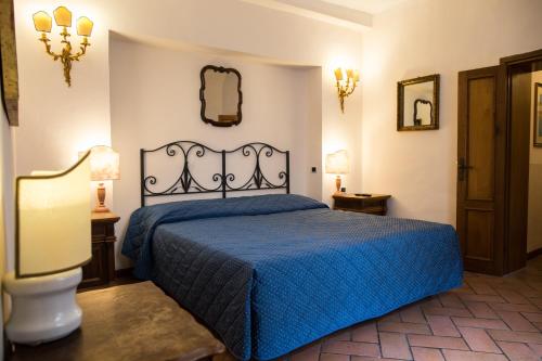Ένα ή περισσότερα κρεβάτια σε δωμάτιο στο Piazza Paradiso Accommodation