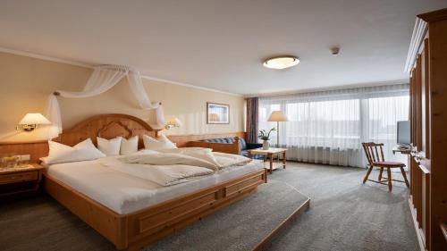 Postel nebo postele na pokoji v ubytování Hotel Andrea