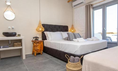 Katil atau katil-katil dalam bilik di Ampelos Residence Naxos