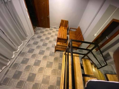 an overhead view of stairs in a house at Angkor Piseth Homestay in Siem Reap