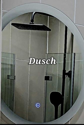 a mirror with the word duchess written on it at ÖSTERLEN PARKEN in Simrishamn