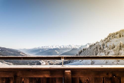 a view from the top of a mountain in the snow at Berggasthaus & Lodge Resterhöhe in Mittersill