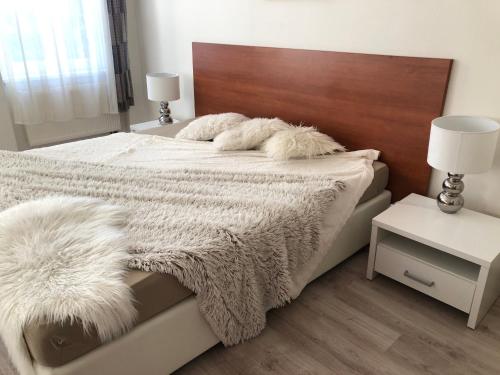 Ένα ή περισσότερα κρεβάτια σε δωμάτιο στο Apartmány Galeta
