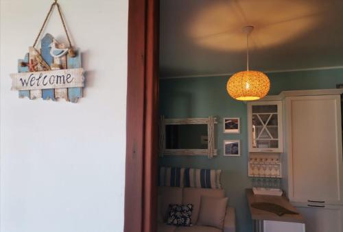 Μια τηλεόραση ή/και κέντρο ψυχαγωγίας στο Casa Azzurra con vista Mare