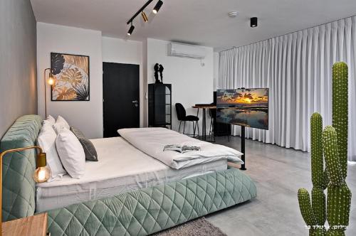 Postel nebo postele na pokoji v ubytování Y HOUSE SUITES