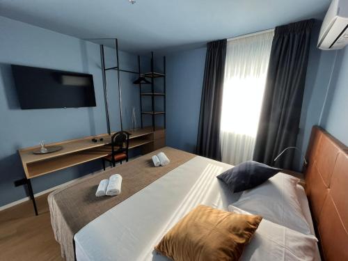 Letto o letti in una camera di La Finestra Sul Mare