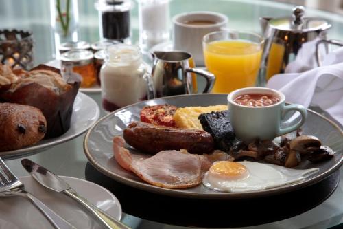 a plate of breakfast food on a table at The Midland in Morecambe