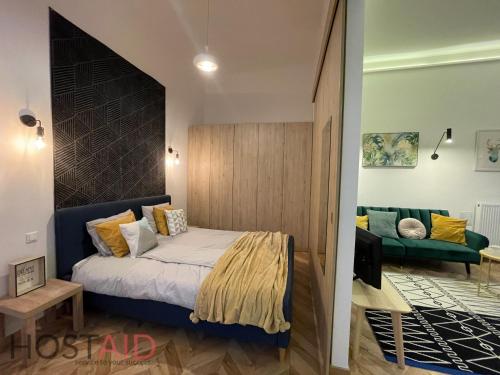 Postel nebo postele na pokoji v ubytování M10 Apartment - hostAID