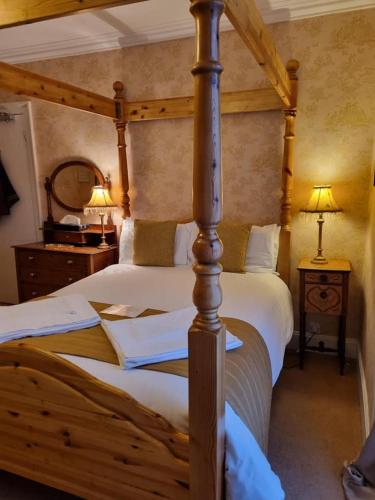 Postel nebo postele na pokoji v ubytování St Vincent Guest House