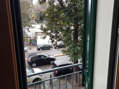 a view of a parking lot from a window at Your Home in Naples in Naples