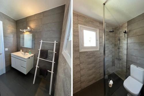 e bagno con servizi igienici, lavandino e doccia. di Lulu Menorca Modern apartment 300m from Cala Blanca beach a Cala Blanca