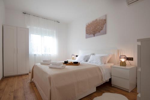 Posteľ alebo postele v izbe v ubytovaní Holiday home SANT'ANNA