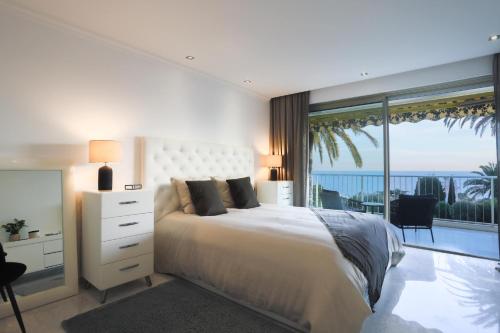 En eller flere senge i et værelse på Sublime appartement vue mer