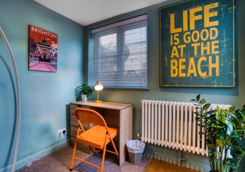 a office with a desk and a chair in a room at Dorset Green Two By My Getaways in Brighton & Hove