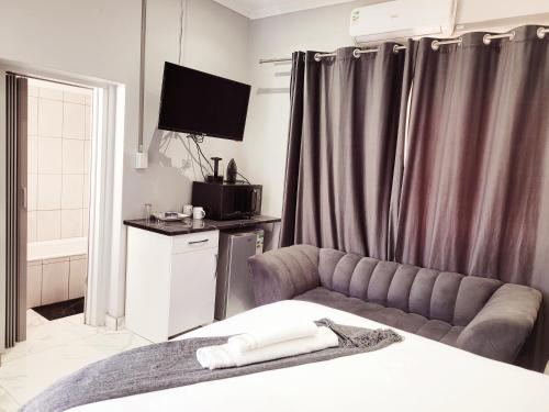 Televisyen dan/atau pusat hiburan di The Pearls guest house