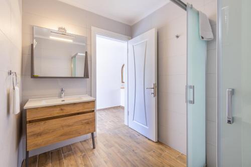 a bathroom with a sink and a mirror at selimiye base in Marmaris