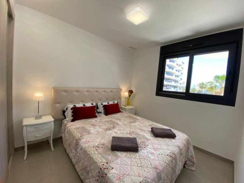 Posteľ alebo postele v izbe v ubytovaní Moderno apartamento a 500 m de la playa