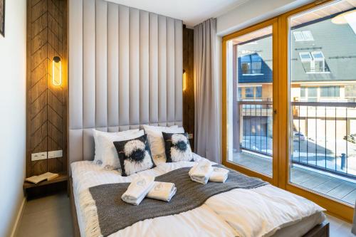 Posteľ alebo postele v izbe v ubytovaní Apartament Owca na wypasie by Apart Concept Podhale