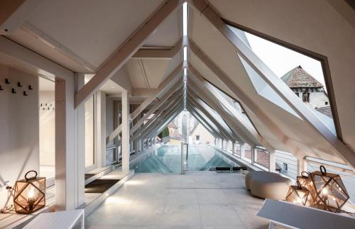 a view of therium of a building with large windows at HOTEL & SPA Goldene Rose in Dinkelsbühl