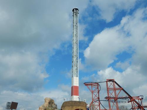 a tall white and red tower with a sky at Flamingo Land - Cedar Wood CW30 in Kirby Misperton