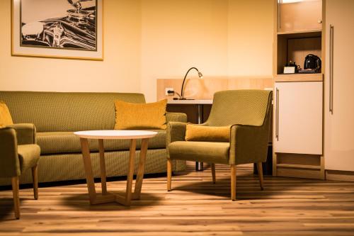 Una cocina o cocineta en First Inn Hotel Zwickau