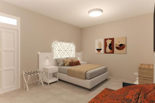 a bedroom with a bed and a nightstand and a bed sidx sidx sidx sidx at Likio Studios in Batsi