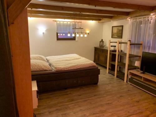 Postel nebo postele na pokoji v ubytování Ferienwohnung "Am Mittag"