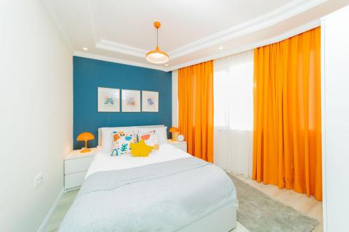 Postel nebo postele na pokoji v ubytování Vibrant and Central Apartment in Muratpasa
